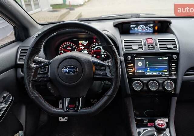 Синий Субару WRX STI, объемом двигателя 2.5 л и пробегом 129 тыс. км за 26500 $, фото 40 на Automoto.ua