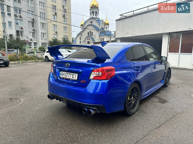 Синий Субару WRX STI, объемом двигателя 2.46 л и пробегом 37 тыс. км за 27000 $, фото 2 на Automoto.ua