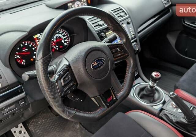 Синий Субару WRX STI, объемом двигателя 2.5 л и пробегом 129 тыс. км за 26500 $, фото 45 на Automoto.ua