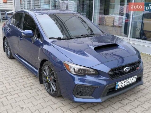 Синий Субару WRX STI, объемом двигателя 2.5 л и пробегом 129 тыс. км за 26500 $, фото 6 на Automoto.ua