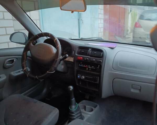 Червоний Сузукі Альто, об'ємом двигуна 1 л та пробігом 133 тис. км за 2650 $, фото 7 на Automoto.ua