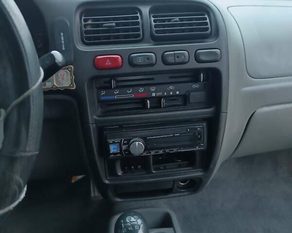 Червоний Сузукі Альто, об'ємом двигуна 1 л та пробігом 133 тис. км за 2650 $, фото 15 на Automoto.ua