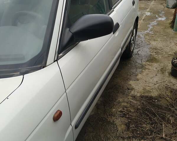 Белый Сузуки Балеро, объемом двигателя 1.6 л и пробегом 260 тыс. км за 2600 $, фото 2 на Automoto.ua