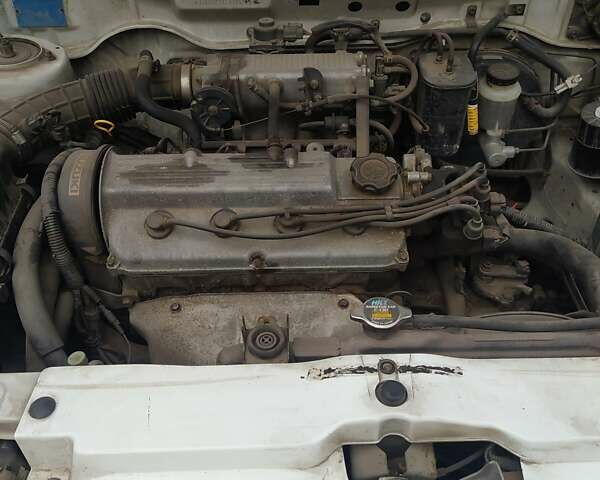 Белый Сузуки Балеро, объемом двигателя 1.6 л и пробегом 260 тыс. км за 2600 $, фото 1 на Automoto.ua