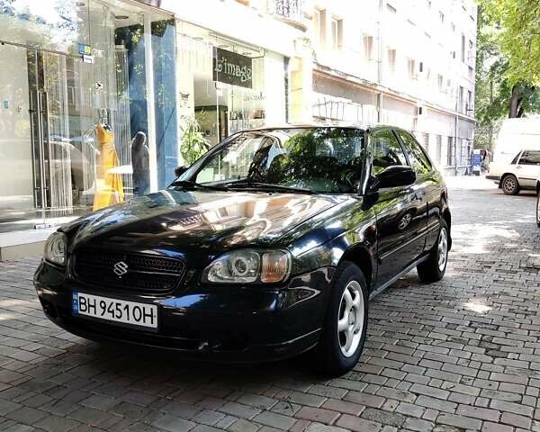 Черный Сузуки Балеро, объемом двигателя 1.3 л и пробегом 332 тыс. км за 2800 $, фото 5 на Automoto.ua