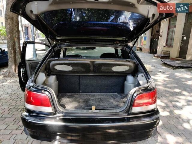 Черный Сузуки Балеро, объемом двигателя 1.3 л и пробегом 332 тыс. км за 2800 $, фото 8 на Automoto.ua