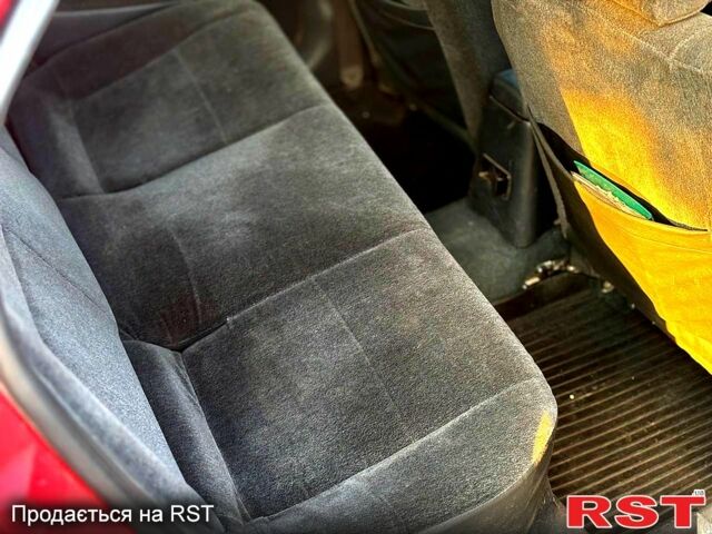 Красный Сузуки Балеро, объемом двигателя 1.6 л и пробегом 200 тыс. км за 2100 $, фото 6 на Automoto.ua