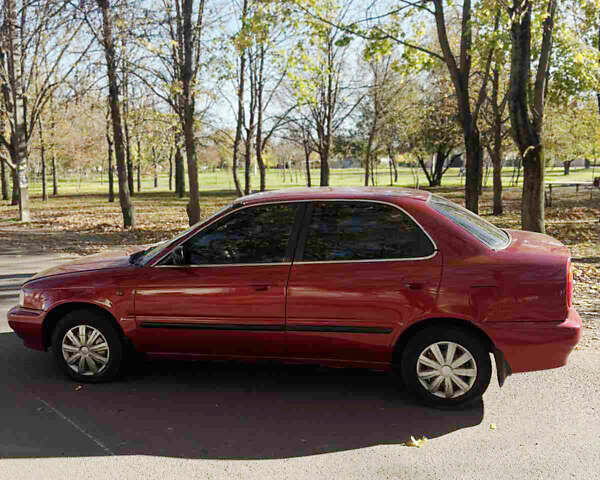 Красный Сузуки Балеро, объемом двигателя 1.6 л и пробегом 378 тыс. км за 1550 $, фото 3 на Automoto.ua