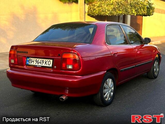 Красный Сузуки Балеро, объемом двигателя 1.6 л и пробегом 200 тыс. км за 2100 $, фото 4 на Automoto.ua