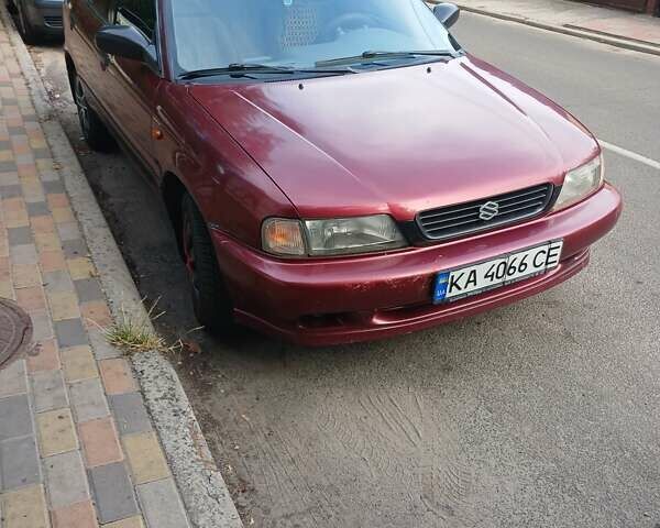 Красный Сузуки Балеро, объемом двигателя 1.59 л и пробегом 320 тыс. км за 2100 $, фото 1 на Automoto.ua