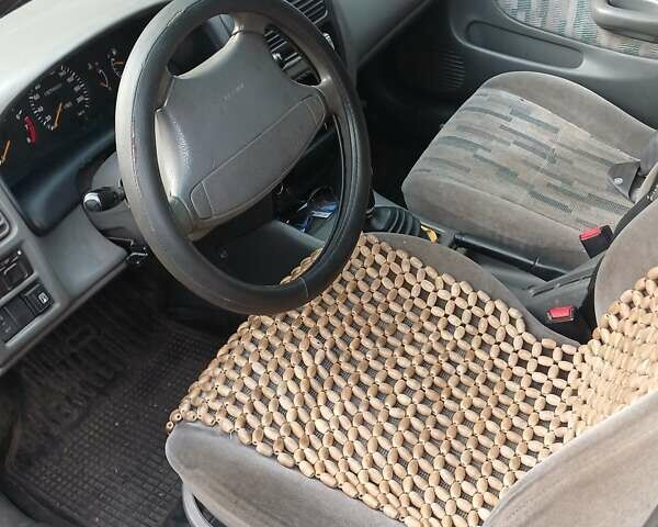 Красный Сузуки Балеро, объемом двигателя 1.59 л и пробегом 320 тыс. км за 2100 $, фото 5 на Automoto.ua