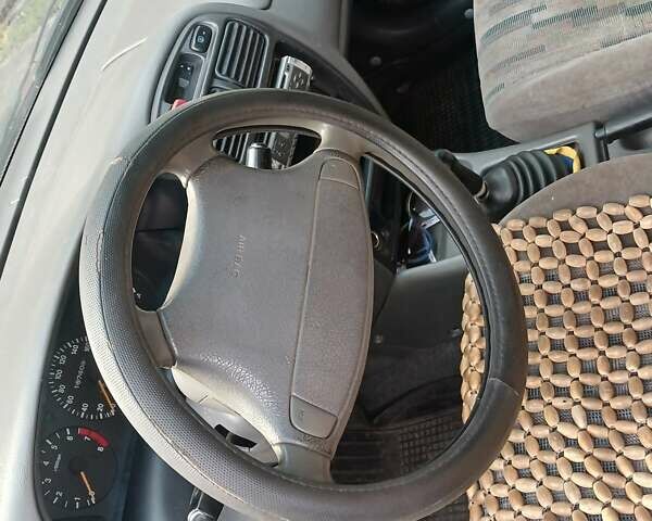 Красный Сузуки Балеро, объемом двигателя 1.59 л и пробегом 320 тыс. км за 2100 $, фото 3 на Automoto.ua