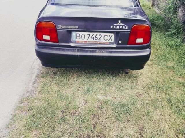 Серый Сузуки Балеро, объемом двигателя 1.3 л и пробегом 387 тыс. км за 1000 $, фото 6 на Automoto.ua