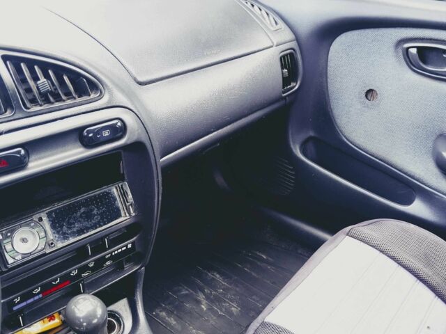 Серый Сузуки Балеро, объемом двигателя 1.3 л и пробегом 387 тыс. км за 1000 $, фото 1 на Automoto.ua