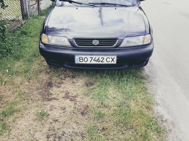 Серый Сузуки Балеро, объемом двигателя 1.3 л и пробегом 387 тыс. км за 1000 $, фото 7 на Automoto.ua