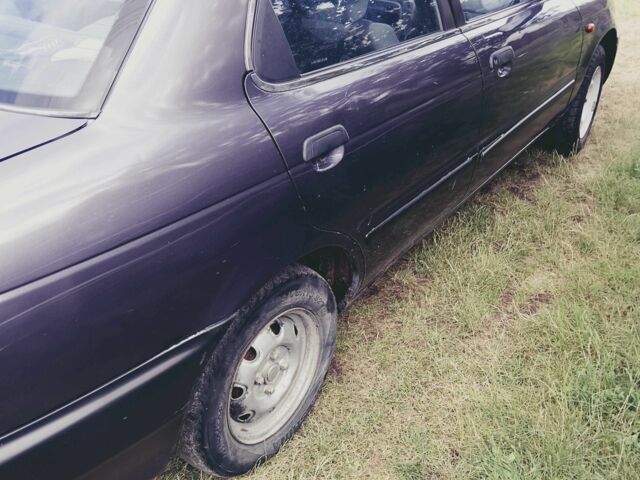 Серый Сузуки Балеро, объемом двигателя 1.3 л и пробегом 387 тыс. км за 1000 $, фото 5 на Automoto.ua