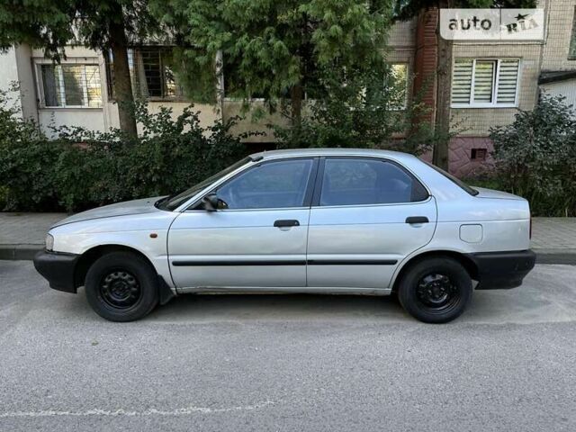 Серый Сузуки Балеро, объемом двигателя 1.3 л и пробегом 200 тыс. км за 1199 $, фото 4 на Automoto.ua