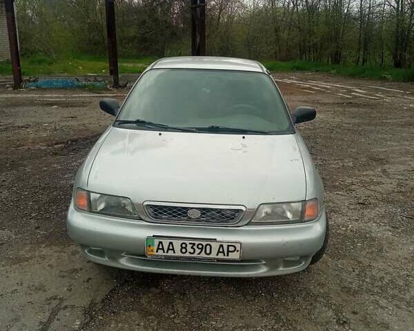 Серый Сузуки Балеро, объемом двигателя 1.6 л и пробегом 300 тыс. км за 1200 $, фото 3 на Automoto.ua