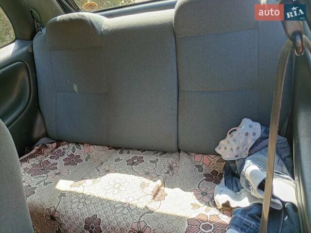 Синий Сузуки Балеро, объемом двигателя 1.3 л и пробегом 225 тыс. км за 2200 $, фото 12 на Automoto.ua