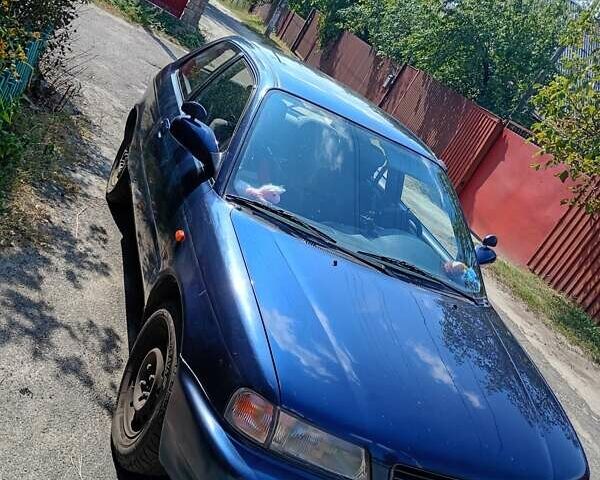 Синий Сузуки Балеро, объемом двигателя 1.3 л и пробегом 225 тыс. км за 2200 $, фото 2 на Automoto.ua