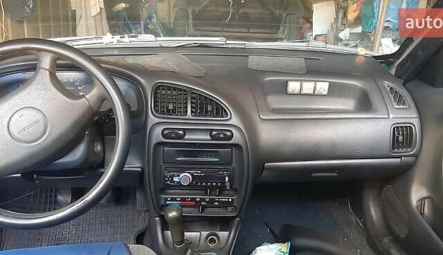 Синий Сузуки Балеро, объемом двигателя 1.59 л и пробегом 435 тыс. км за 2700 $, фото 2 на Automoto.ua