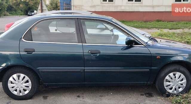 Зеленый Сузуки Балеро, объемом двигателя 1.3 л и пробегом 416 тыс. км за 1600 $, фото 3 на Automoto.ua
