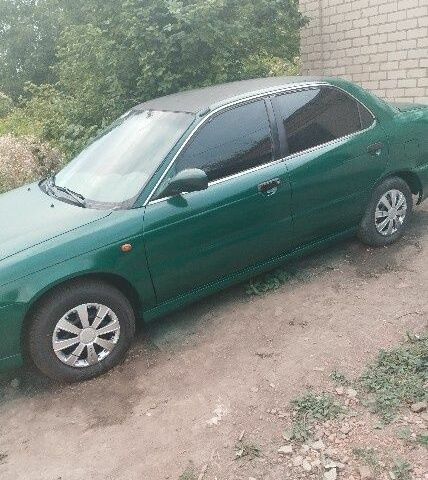 Зеленый Сузуки Балеро, объемом двигателя 1.3 л и пробегом 90 тыс. км за 2381 $, фото 4 на Automoto.ua