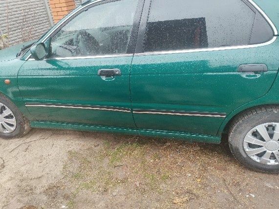 Зеленый Сузуки Балеро, объемом двигателя 1.3 л и пробегом 90 тыс. км за 2381 $, фото 1 на Automoto.ua