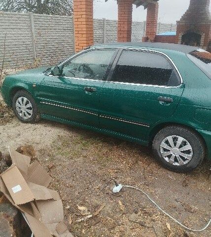 Зеленый Сузуки Балеро, объемом двигателя 1.3 л и пробегом 90 тыс. км за 2381 $, фото 2 на Automoto.ua