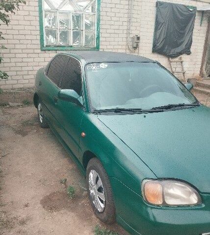 Зеленый Сузуки Балеро, объемом двигателя 1.3 л и пробегом 90 тыс. км за 2381 $, фото 3 на Automoto.ua