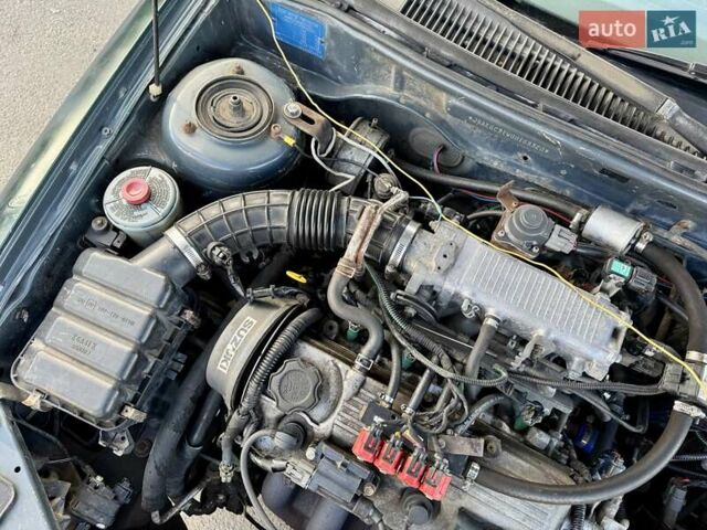 Зеленый Сузуки Балеро, объемом двигателя 1.6 л и пробегом 280 тыс. км за 1000 $, фото 15 на Automoto.ua