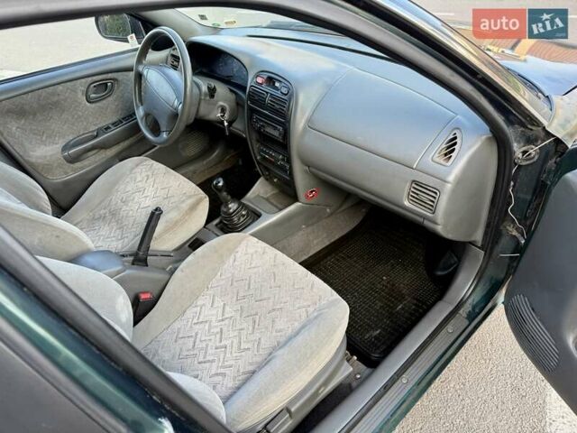 Зеленый Сузуки Балеро, объемом двигателя 1.6 л и пробегом 280 тыс. км за 1000 $, фото 8 на Automoto.ua