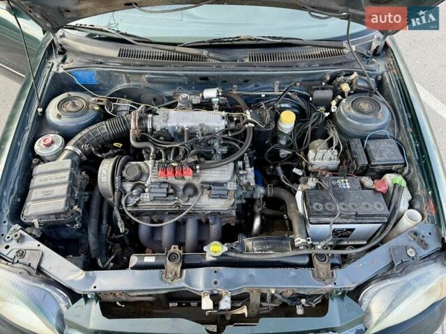 Зеленый Сузуки Балеро, объемом двигателя 1.6 л и пробегом 280 тыс. км за 1000 $, фото 13 на Automoto.ua