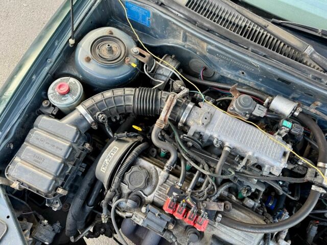 Зеленый Сузуки Балеро, объемом двигателя 0 л и пробегом 270 тыс. км за 1000 $, фото 15 на Automoto.ua