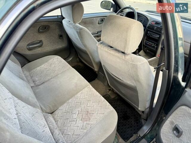 Зеленый Сузуки Балеро, объемом двигателя 1.6 л и пробегом 280 тыс. км за 1000 $, фото 9 на Automoto.ua