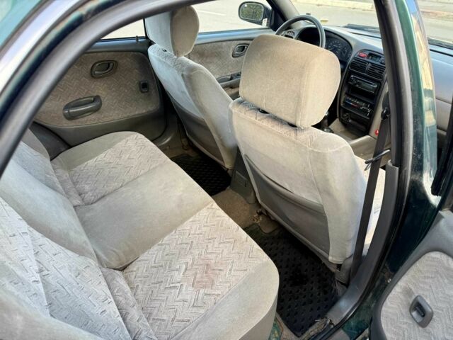 Зеленый Сузуки Балеро, объемом двигателя 0 л и пробегом 270 тыс. км за 1000 $, фото 9 на Automoto.ua