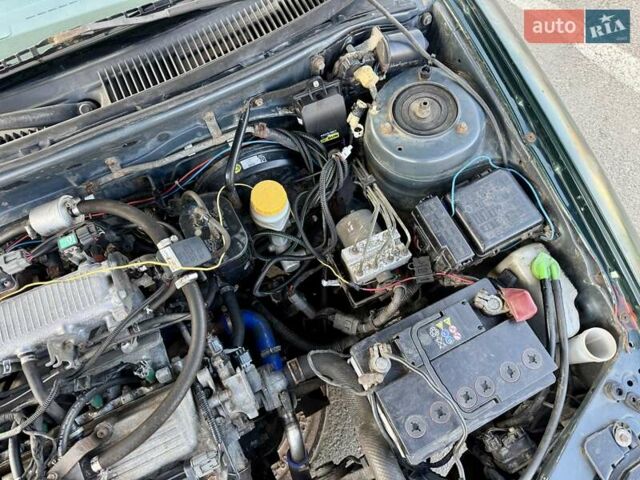 Зеленый Сузуки Балеро, объемом двигателя 1.6 л и пробегом 280 тыс. км за 1000 $, фото 14 на Automoto.ua