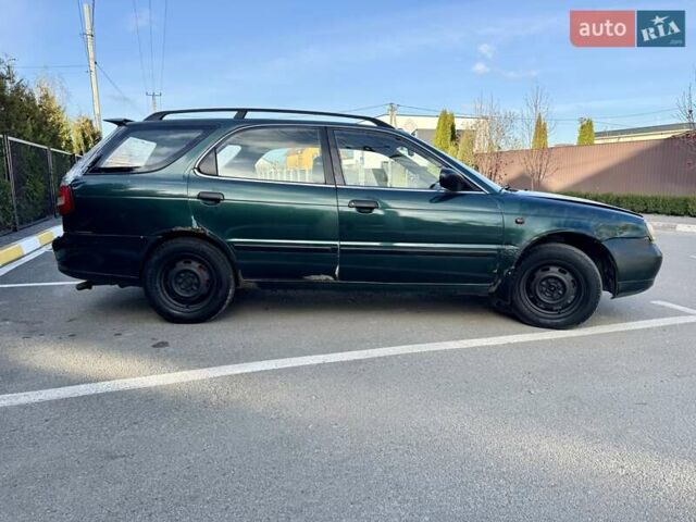 Зеленый Сузуки Балеро, объемом двигателя 1.6 л и пробегом 280 тыс. км за 1000 $, фото 5 на Automoto.ua