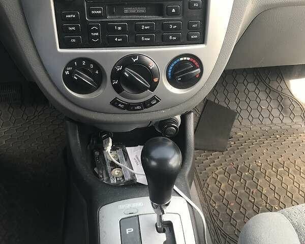 Сірий Сузукі Форенза, об'ємом двигуна 2 л та пробігом 120 тис. км за 3500 $, фото 5 на Automoto.ua