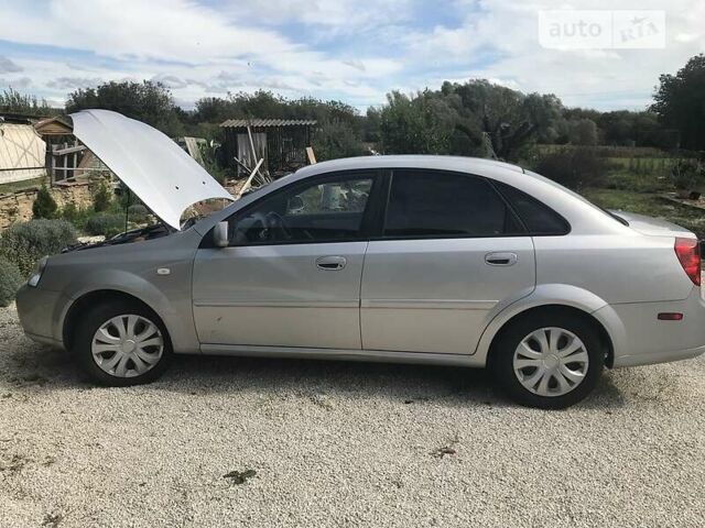 Сірий Сузукі Форенза, об'ємом двигуна 2 л та пробігом 120 тис. км за 3500 $, фото 2 на Automoto.ua