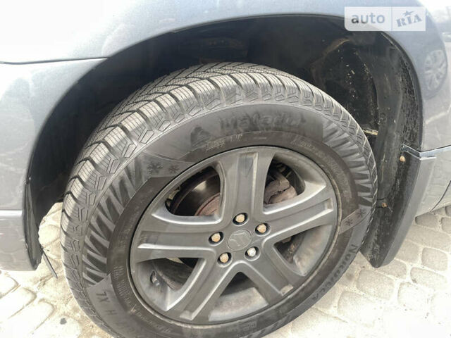Білий Сузукі Гранд Вітара, об'ємом двигуна 2 л та пробігом 205 тис. км за 7050 $, фото 15 на Automoto.ua