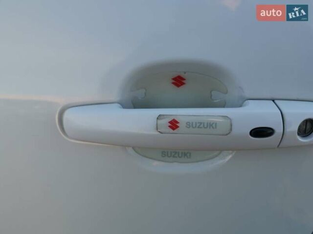 Білий Сузукі Гранд Вітара, об'ємом двигуна 1.87 л та пробігом 196 тис. км за 11500 $, фото 12 на Automoto.ua
