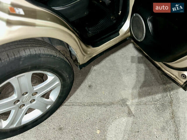 Бежевый Сузуки Гранд Витара, объемом двигателя 2 л и пробегом 236 тыс. км за 6500 $, фото 14 на Automoto.ua