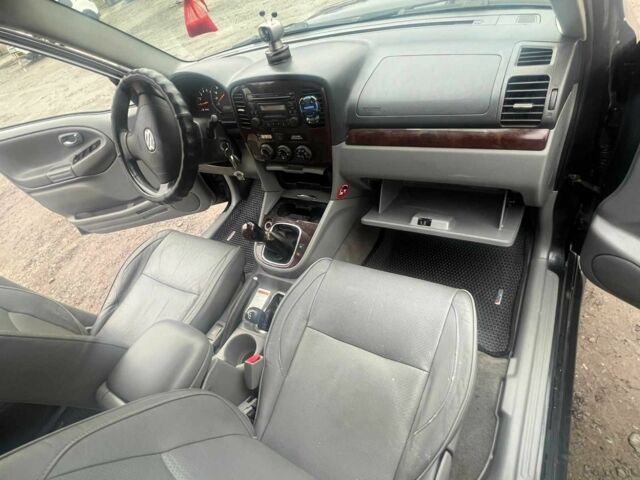 Черный Сузуки Гранд Витара, объемом двигателя 1.9 л и пробегом 3 тыс. км за 5000 $, фото 12 на Automoto.ua