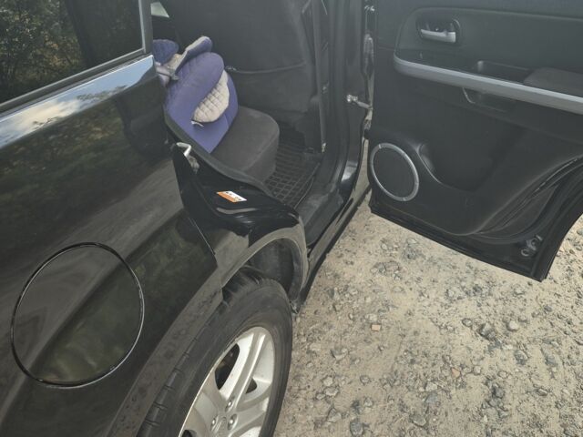 Чорний Сузукі Гранд Вітара, об'ємом двигуна 2 л та пробігом 216 тис. км за 7700 $, фото 3 на Automoto.ua