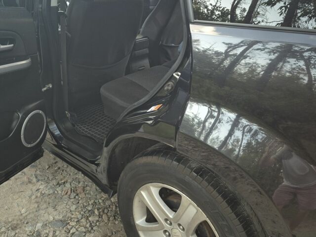 Чорний Сузукі Гранд Вітара, об'ємом двигуна 2 л та пробігом 216 тис. км за 7700 $, фото 2 на Automoto.ua