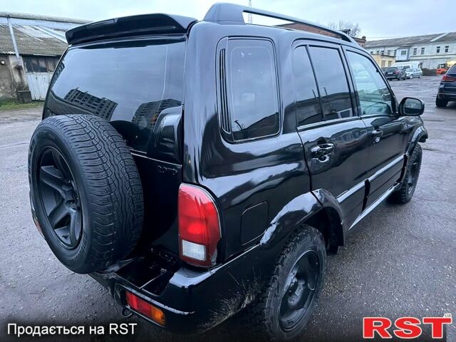 Черный Сузуки Гранд Витара, объемом двигателя 2 л и пробегом 281 тыс. км за 2500 $, фото 1 на Automoto.ua