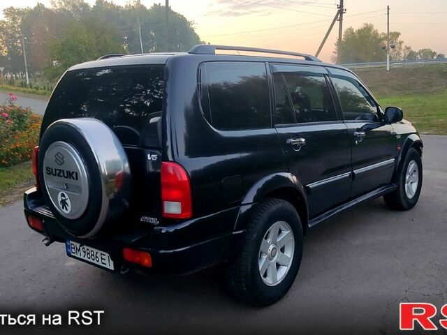 Черный Сузуки Гранд Витара, объемом двигателя 2.7 л и пробегом 250 тыс. км за 5200 $, фото 6 на Automoto.ua