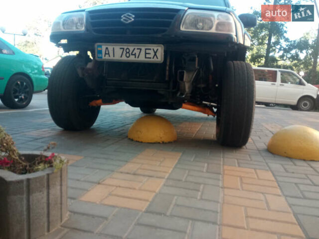 Черный Сузуки Гранд Витара, объемом двигателя 2 л и пробегом 270 тыс. км за 7500 $, фото 4 на Automoto.ua