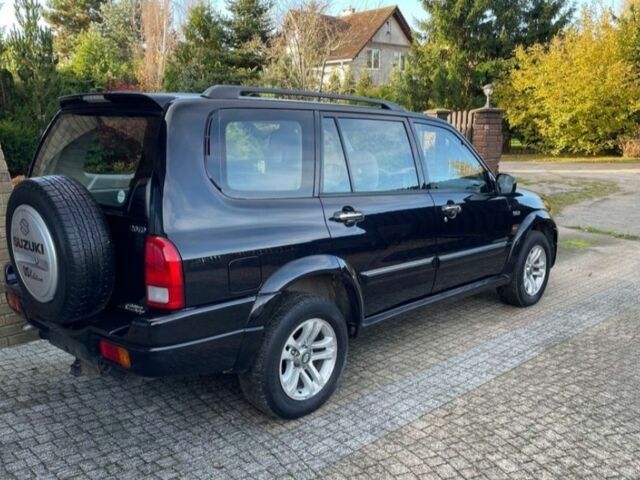 Чорний Сузукі Гранд Вітара, об'ємом двигуна 2 л та пробігом 270 тис. км за 1800 $, фото 4 на Automoto.ua